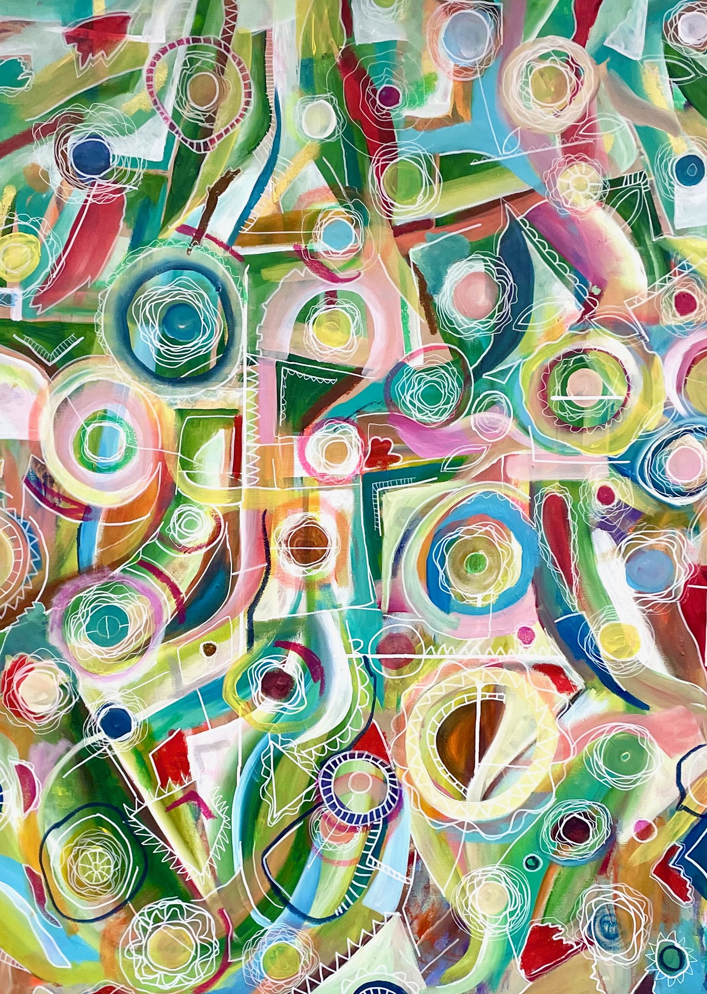 An abstract painting with numerous circles within circles and angular shapes with graphic white lines on top. There are numerous colors, primarily in pastel colors of pin, yellow, green, and blue. There are also a few dark green and red undertones. 