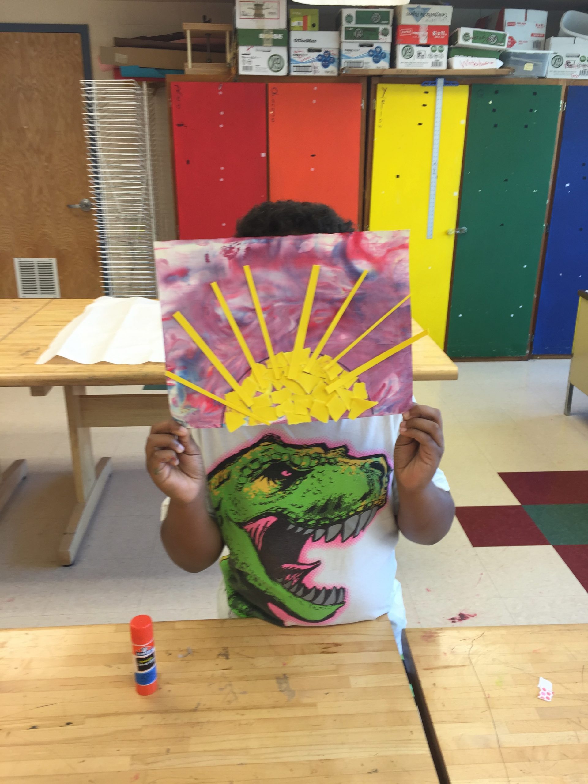 Child with art work